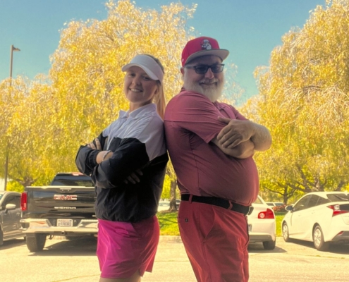 Jp Golf posing with female golfer